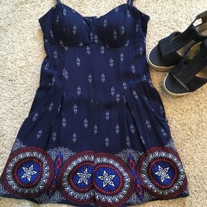 Adorable romper, size medium. Red, white and blue.